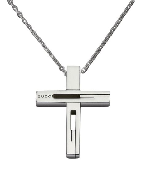 gucci cross pendant.